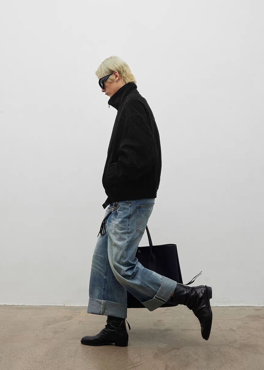 Black ruched horsehide boots on foot