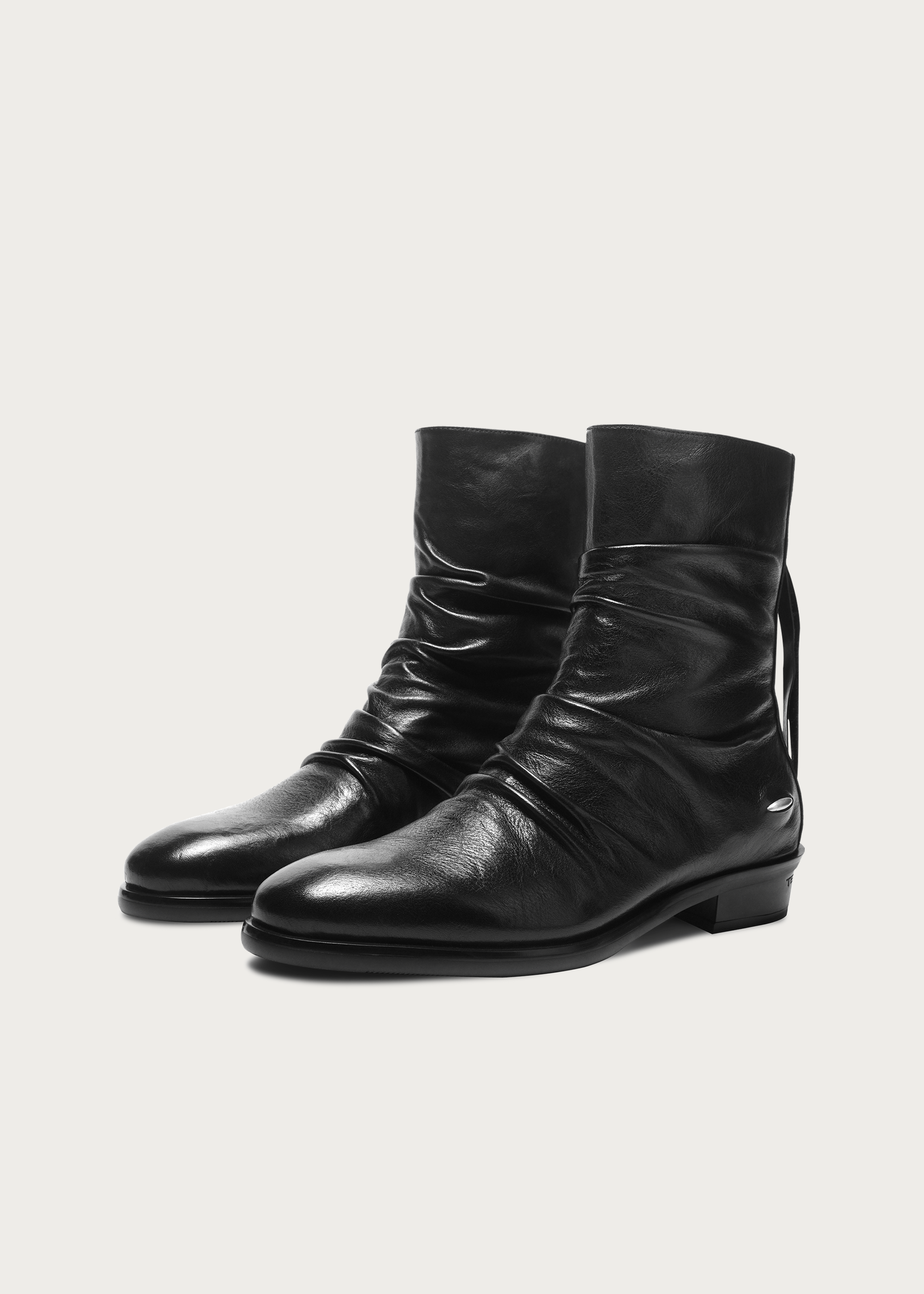 Black horsehide ankle boots styling view