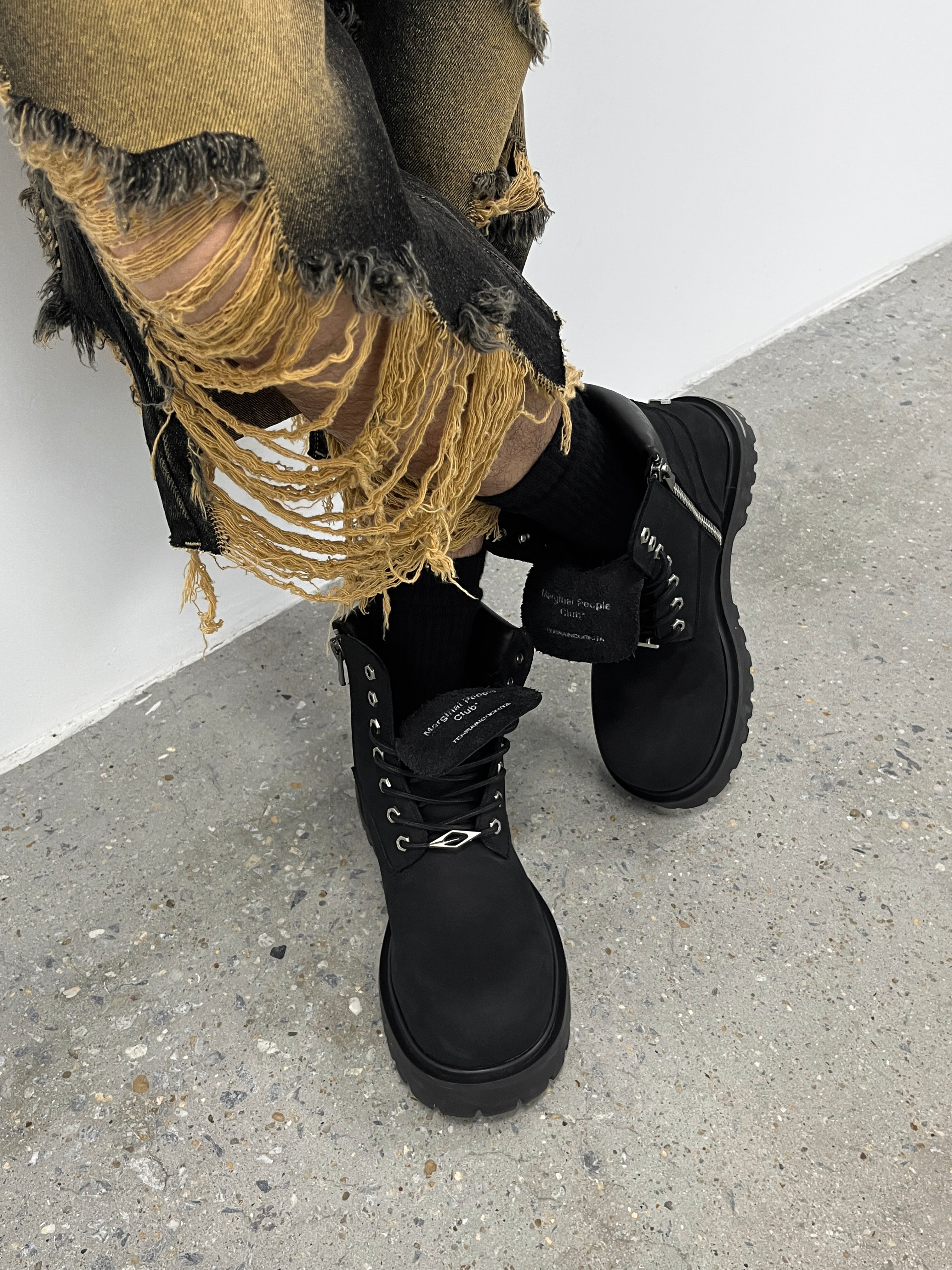 Black cowhide workwear boots side profile