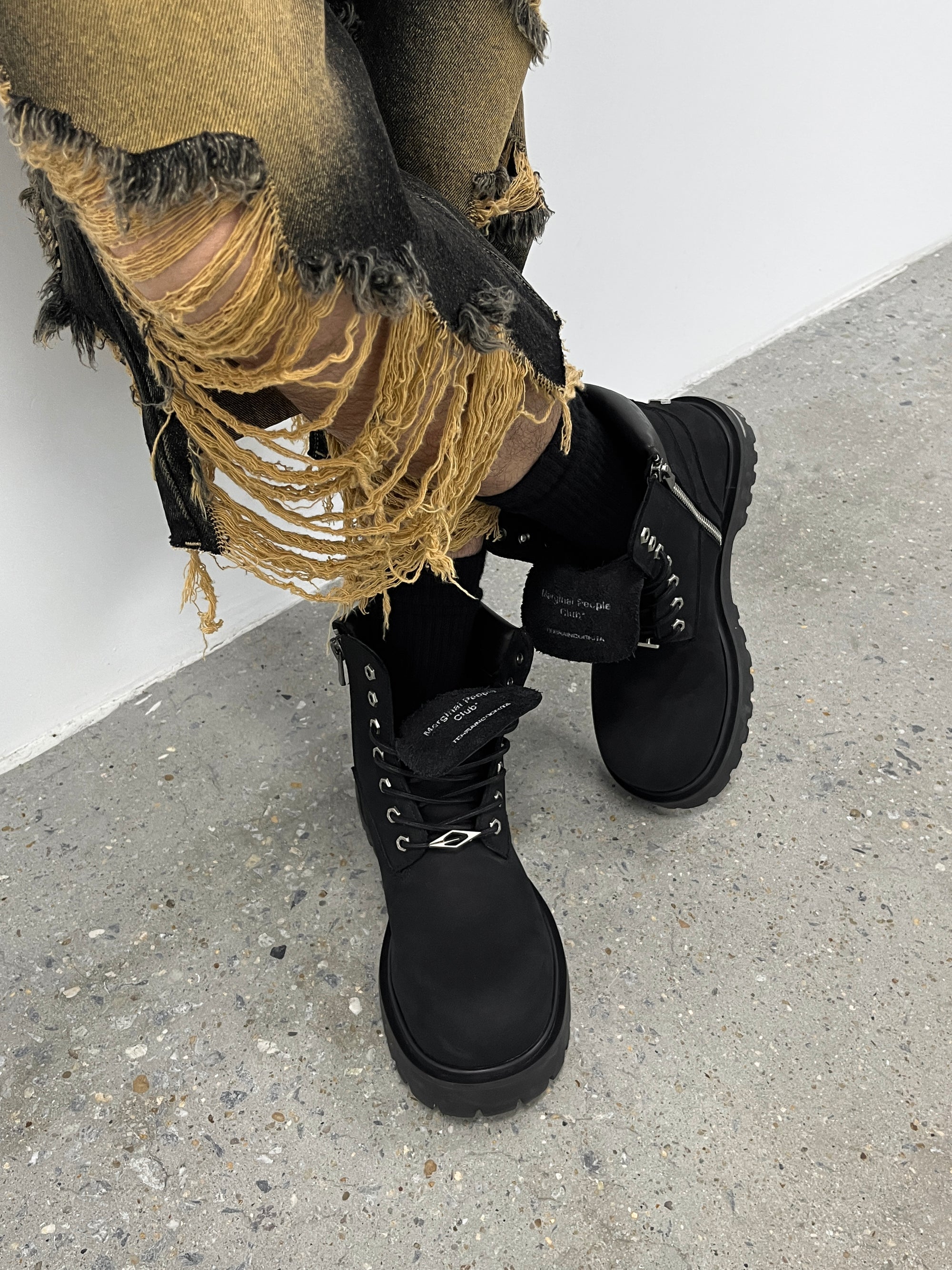 Black cowhide workwear boots side profile
